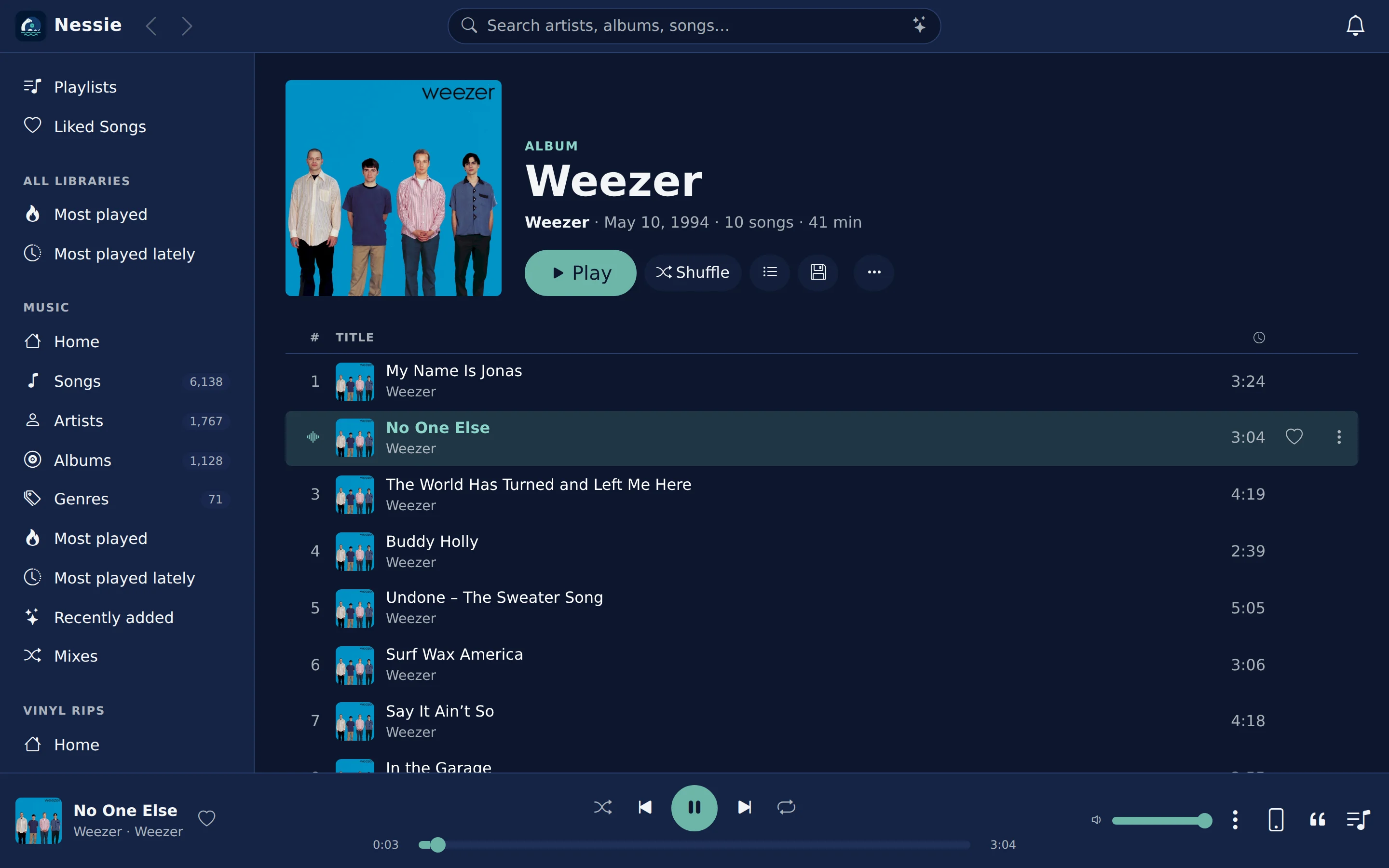 The album page on a desktop, playing a song